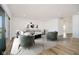 Bright living room features modern decor, neutral color palette, and plush rug at 202 Asbury Dr, Anderson, IN 46013