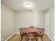 Simple dining area with table and four chairs at 23 Trails End St, Greenwood, IN 46142