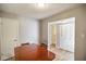 Simple dining room with wood table and access to other rooms at 23 Trails End St, Greenwood, IN 46142