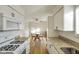 Open concept kitchen and dining area with hardwood floors at 23 Trails End St, Greenwood, IN 46142