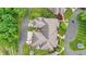 An aerial view of a home nestled among lush greenery and trees at 316 Northpointe Ct, Danville, IN 46122
