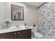 Bathroom features a vanity with a mirror and a shower with a patterned curtain at 316 Northpointe Ct, Danville, IN 46122