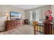 Cozy bedroom with wood floors and a sunny window view at 316 Northpointe Ct, Danville, IN 46122