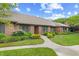 Lovely brick home with a well-maintained lawn and a welcoming walkway at 316 Northpointe Ct, Danville, IN 46122