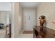 Bright entryway with tile flooring and a decorative console table at 316 Northpointe Ct, Danville, IN 46122