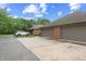 A wide driveway to multiple garages on a home's exterior at 316 Northpointe Ct, Danville, IN 46122