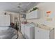 Functional laundry room equipped with modern appliances and ample storage space at 316 Northpointe Ct, Danville, IN 46122