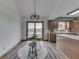 Inviting eat-in kitchen with a dining area and sliding glass doors to backyard at 4208 E Epler Ave, Indianapolis, IN 46237