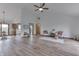 Spacious living room with vaulted ceilings, hardwood floors, and an open floor plan at 4208 E Epler Ave, Indianapolis, IN 46237