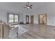 Open living room with vaulted ceilings, hardwood floors, and neutral decor at 4208 E Epler Ave, Indianapolis, IN 46237