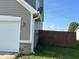 Exterior view of attached garage featuring a new paint job at 672 Rocky Meadow Dr, Greenwood, IN 46143