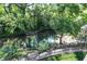 Enjoy the beauty of the surrounding woods from this home's backyard deck at 3441 S Overlook Pass, New Palestine, IN 46163
