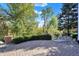 Wide backyard featuring a patio, greenery, and scenic landscaping, perfect for entertaining and relaxation at 3441 S Overlook Pass, New Palestine, IN 46163