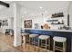 Stylish basement bar area with seating, custom shelving, and modern finishes, perfect for entertaining guests at 3441 S Overlook Pass, New Palestine, IN 46163