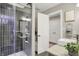 Modern bathroom features glass-enclosed shower, sleek vanity, and stylish design at 3441 S Overlook Pass, New Palestine, IN 46163