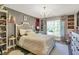 Charming bedroom features natural light and stylish decor throughout at 3441 S Overlook Pass, New Palestine, IN 46163