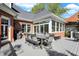 A luxurious deck with outdoor dining area featuring a table with seating for eight at 3441 S Overlook Pass, New Palestine, IN 46163