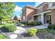 Charming home featuring manicured landscaping and a stone walkway, enhancing its curb appeal at 3441 S Overlook Pass, New Palestine, IN 46163