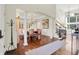 Elegant foyer with hardwood floors and view into a dining room, perfect for entertaining at 3441 S Overlook Pass, New Palestine, IN 46163