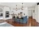 Bright kitchen showcasing a large island with seating, white cabinetry, and stainless steel appliances at 3441 S Overlook Pass, New Palestine, IN 46163