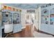 Lovely office with french doors, custom built-ins, hardwood floors, and lots of natural light at 3441 S Overlook Pass, New Palestine, IN 46163