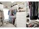 Walk-in closet with custom shelving, drawers, and hanging racks at 3441 S Overlook Pass, New Palestine, IN 46163