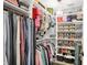Organized walk-in closet with ample storage space for clothing and shoes at 3441 S Overlook Pass, New Palestine, IN 46163