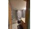 This bathroom has a shower, sink, toilet, medicine cabinet and is conveniently located near the door at 8429 Admirals Cv, Indianapolis, IN 46236