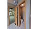 Bathroom and walk-in closet featuring natural light and neutral walls at 8429 Admirals Cv, Indianapolis, IN 46236