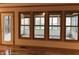 An abundance of natural light fills the sunroom beyond a set of large windows at 8429 Admirals Cv, Indianapolis, IN 46236