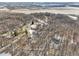 Aerial view of neighborhood with houses and snowy landscape at 9706 N Glen Dr, Mooresville, IN 46158