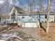 Two-story home with attached garage and stone accents at 9706 N Glen Dr, Mooresville, IN 46158