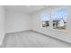 A bedroom showcasing soft carpet, multiple windows and a light, airy ambiance at 1082 Stubble Run, Danville, IN 46122