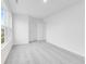 This bedroom features neutral carpeting, white walls, and ample natural light at 1082 Stubble Run, Danville, IN 46122