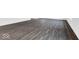 Elegant gray wood flooring, offering a blend of style and durability throughout the home at 1082 Stubble Run, Danville, IN 46122