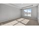 Bright bedroom with plush carpeting and large window at 16689 Cattle Hollow Ln, Noblesville, IN 46060