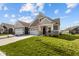 Beautiful craftsman-style homes feature a two-car garage, well-kept lawn, and neighborhood setting at 16689 Cattle Hollow Ln, Noblesville, IN 46060