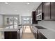 Bright kitchen featuring stainless steel appliances, ample counter space, and stylish cabinetry at 16689 Cattle Hollow Ln, Noblesville, IN 46060