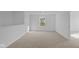 Spacious bedroom featuring neutral carpet and natural light at 1837 James Pierce Dr, Shelbyville, IN 46176