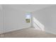 Cozy bedroom features neutral carpeting and a bright window view at 1837 James Pierce Dr, Shelbyville, IN 46176