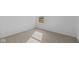 Cozy bedroom features neutral carpeting and a sunny window at 1837 James Pierce Dr, Shelbyville, IN 46176
