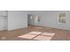 Open-concept living room featuring modern flooring and plenty of natural light, ideal for comfortable living at 1837 James Pierce Dr, Shelbyville, IN 46176