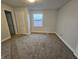 Bright bedroom with neutral walls and carpet at 3687 E 800 N, Alexandria, IN 46001