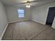 Spacious bedroom with new carpet and large window at 3687 E 800 N, Alexandria, IN 46001