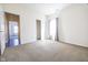 Bright, carpeted bedroom with a closet perfect for relaxation and comfort at 5677 Starla Ln, Plainfield, IN 46168