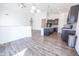 An open floor plan combines the living room, dining room, and kitchen with plenty of space at 5677 Starla Ln, Plainfield, IN 46168