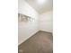 A walk-in closet with built-in shelving offers ample storage space for organization at 5677 Starla Ln, Plainfield, IN 46168