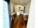 Empty room with counter space, tables, and white walls at 1214 N Penn St, Muncie, IN 47303