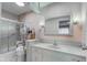 Bathroom features a sink, toilet, shower and vanity providing functionality with classic design elements at 2856 Jamieson Ln, Indianapolis, IN 46268