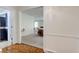 Bright living room showcasing hardwood floors, archway to the kitchen, and white trim at 2856 Jamieson Ln, Indianapolis, IN 46268